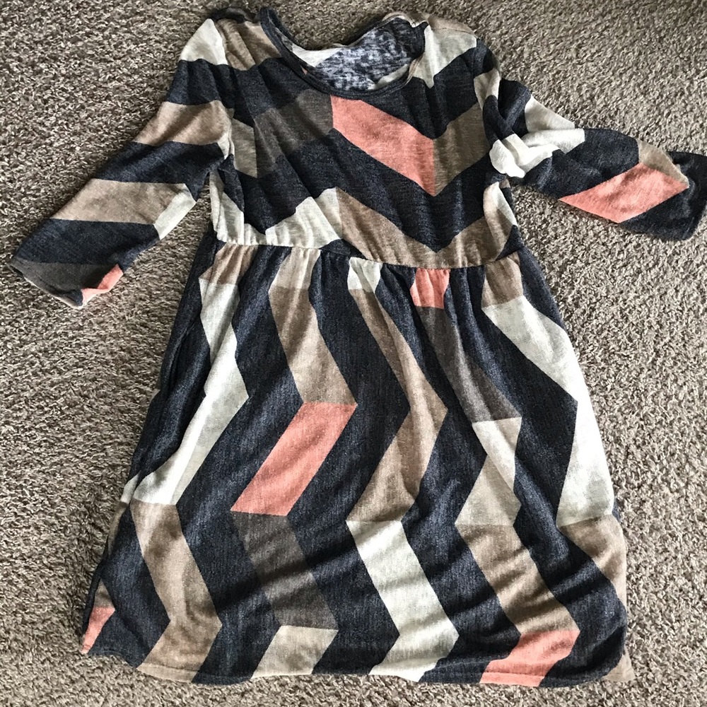 Above the knee length dress. Never worn. No tags.